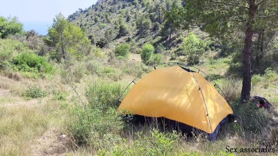 The tourist heard loud moaning and caught couple fucking in the tent.